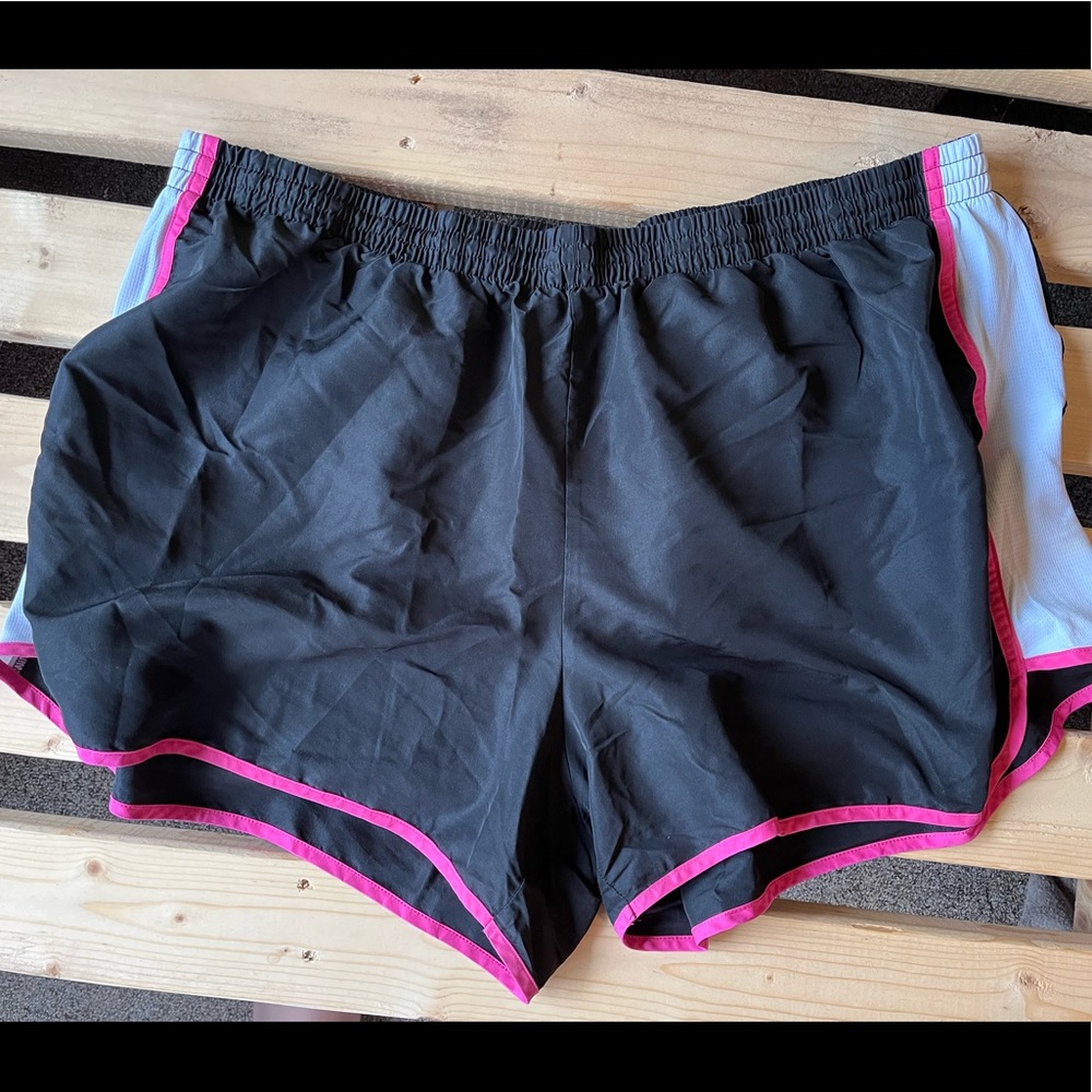 Black plus size running workout athletic shorts with white side panels and pink